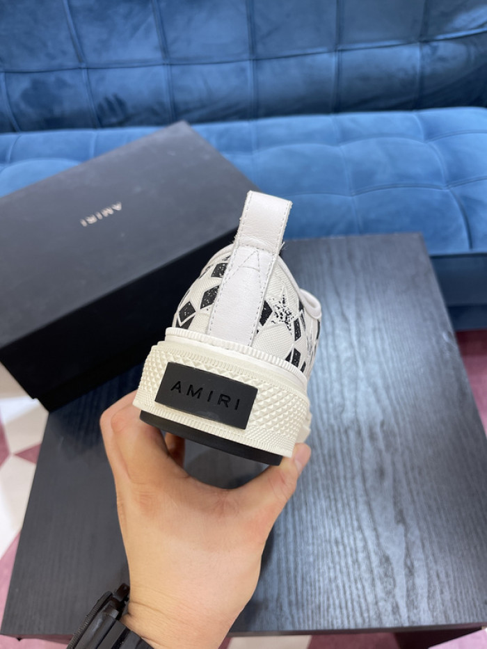 amiri* appliquéd leather and canvas sneakers