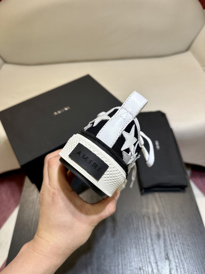 amiri* appliquéd leather and canvas sneakers